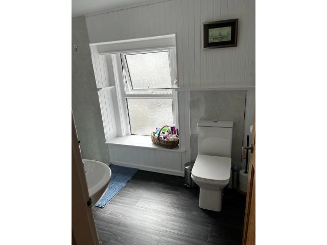 Bathroom with walk-in shower and heated towel rail